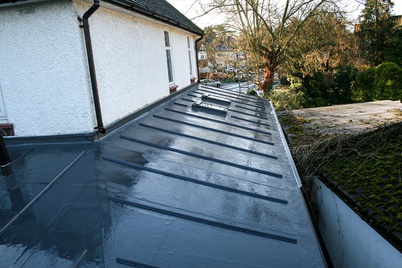 Replacing leaking shallow pitched tiled roof